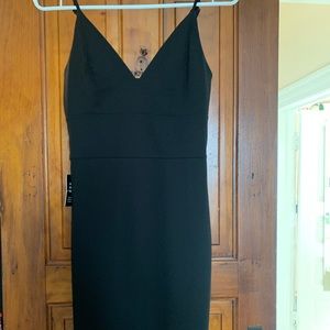 Black dress. Fitted. Never worn